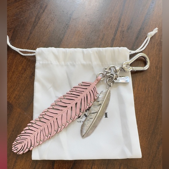 Coach Accessories - Coach Leather and Nickel Feather Bag Charm Light Pink